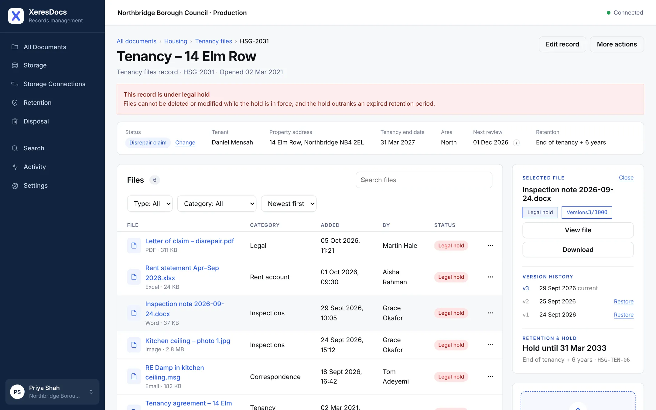 A file in XeresDocs with its three versions and the restore links beside them.